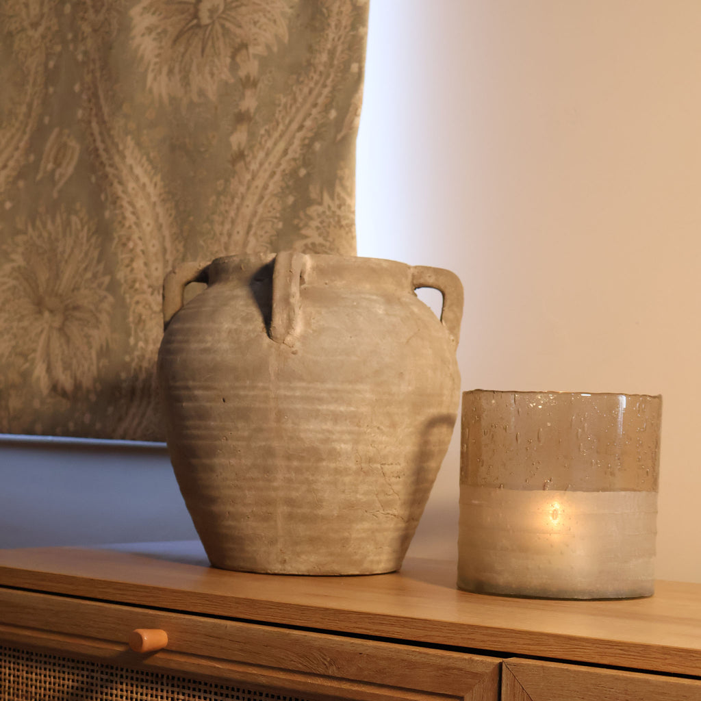 Rustic Vase paired with a candle holder 