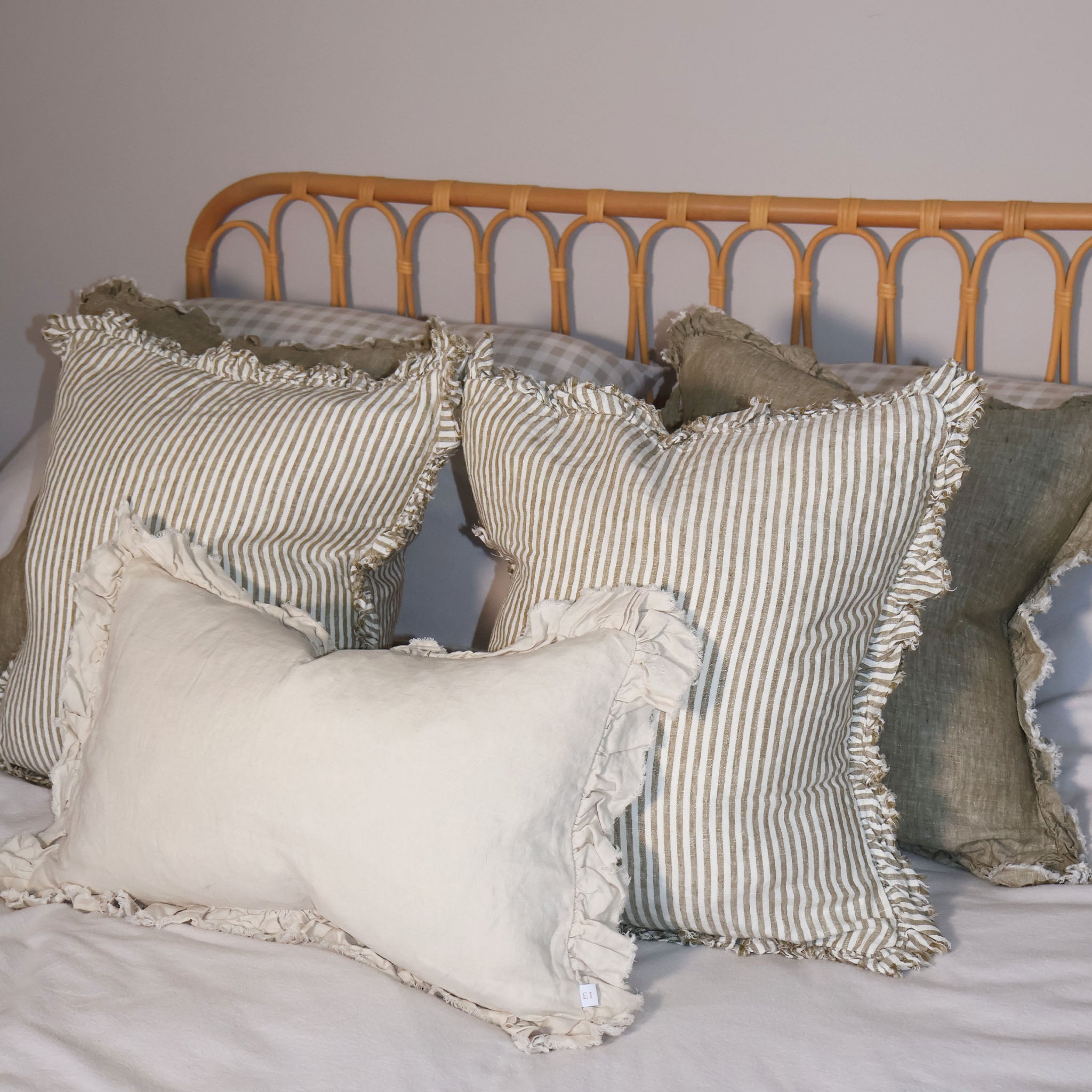 Set of decorative cushions on a bed