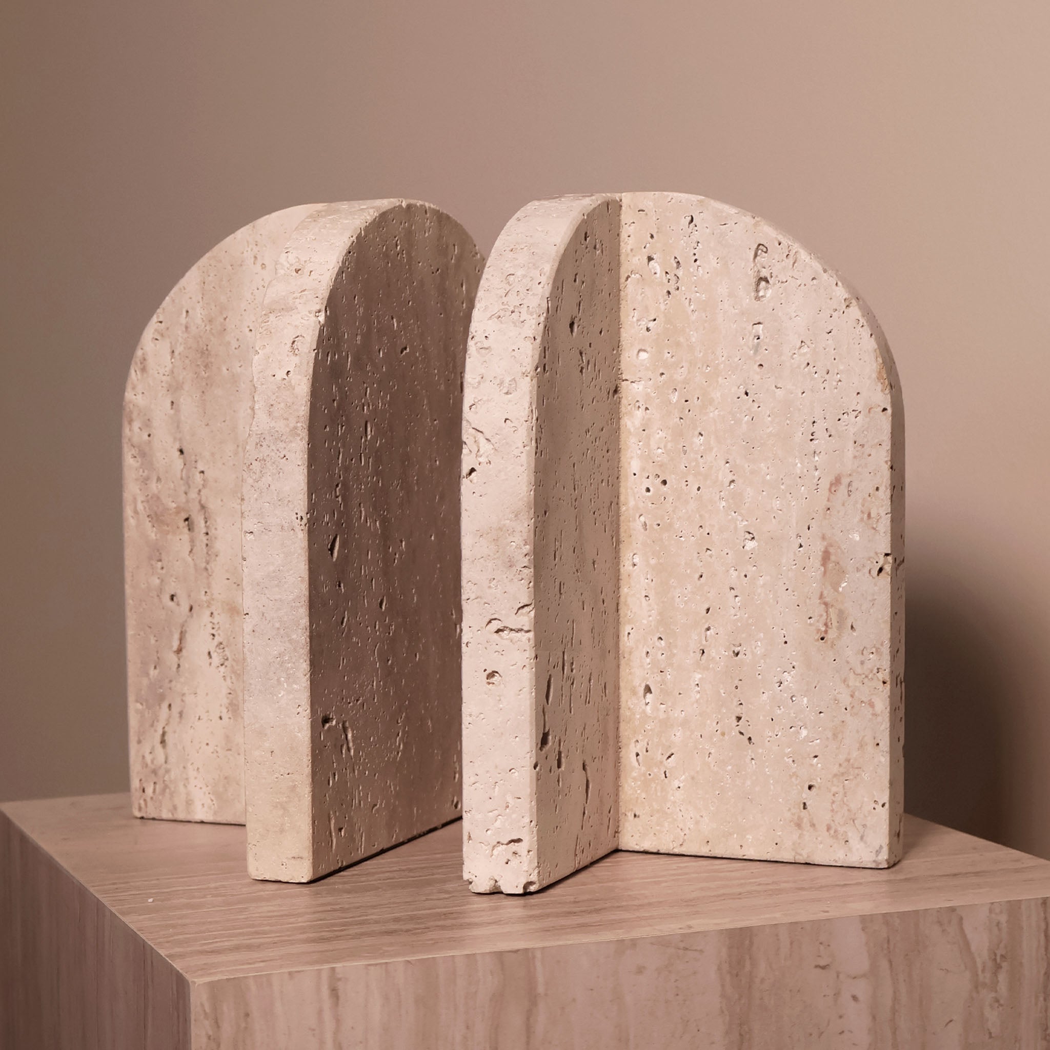 Arched travertine bookends